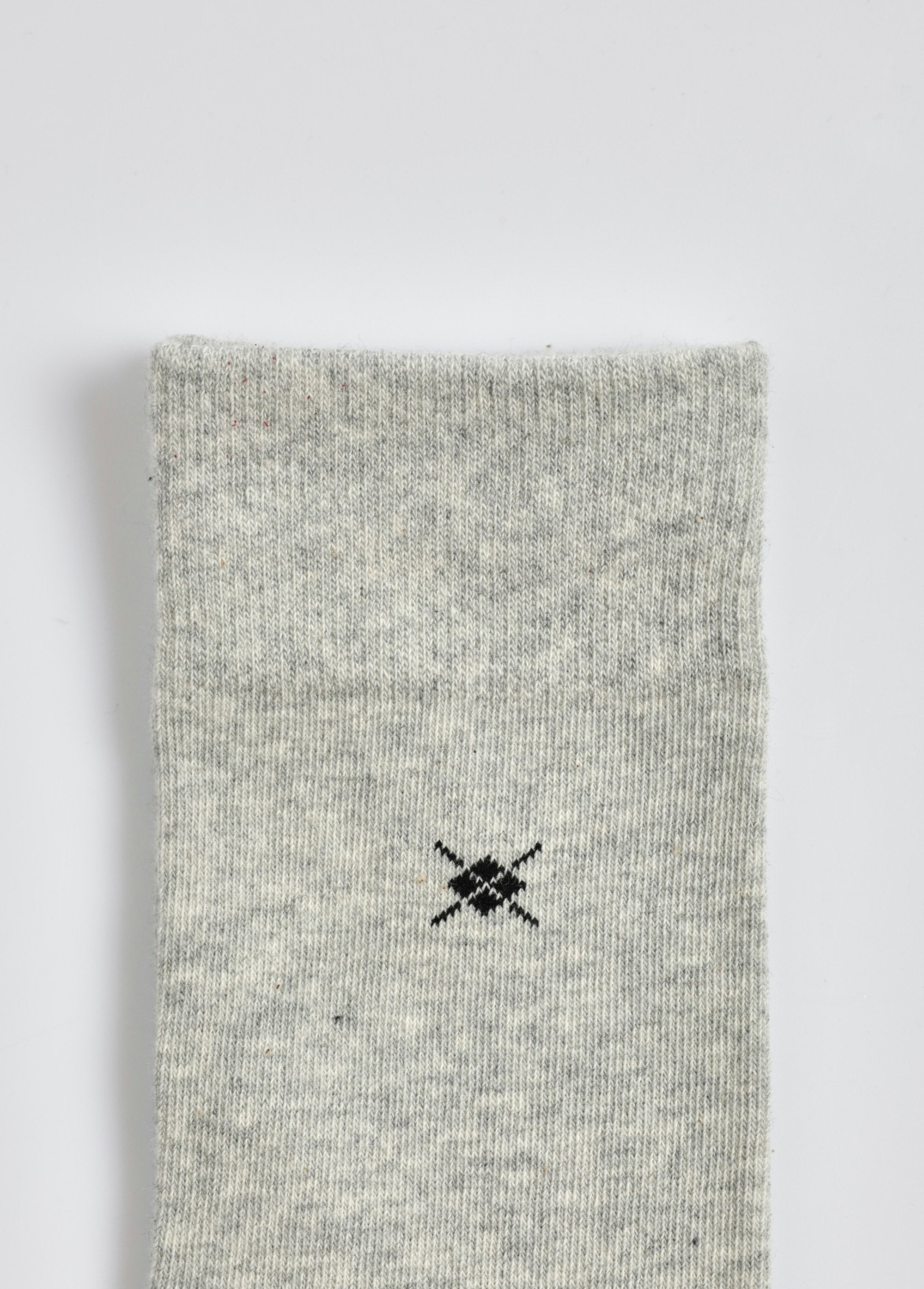 Par_de_calcetines_con_pequeños_estampados_Negro_a_juego_DE2_slim