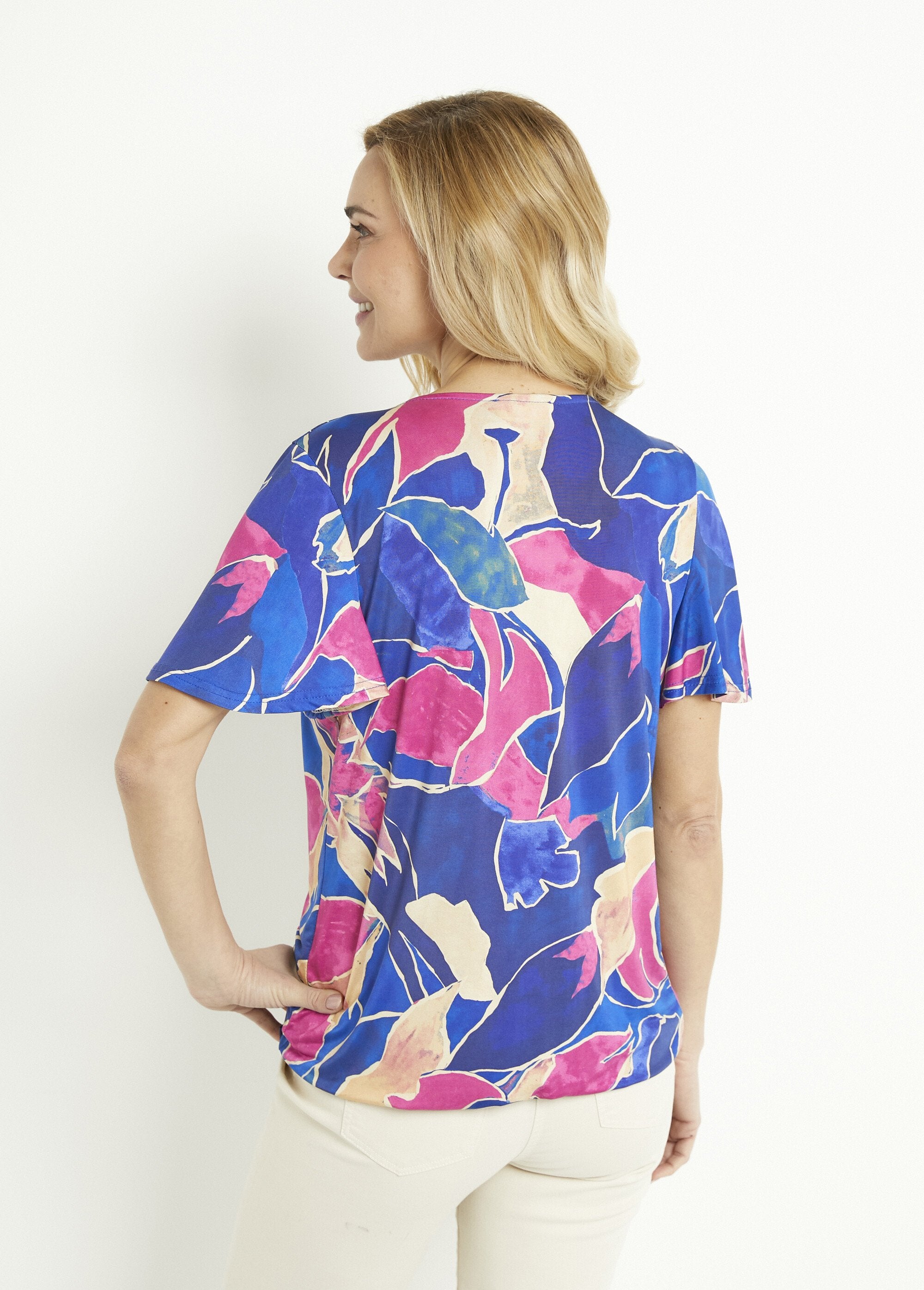 Camiseta_larga_cruzada_con_estampado_floral_azul_y_rosa_DO1_slim