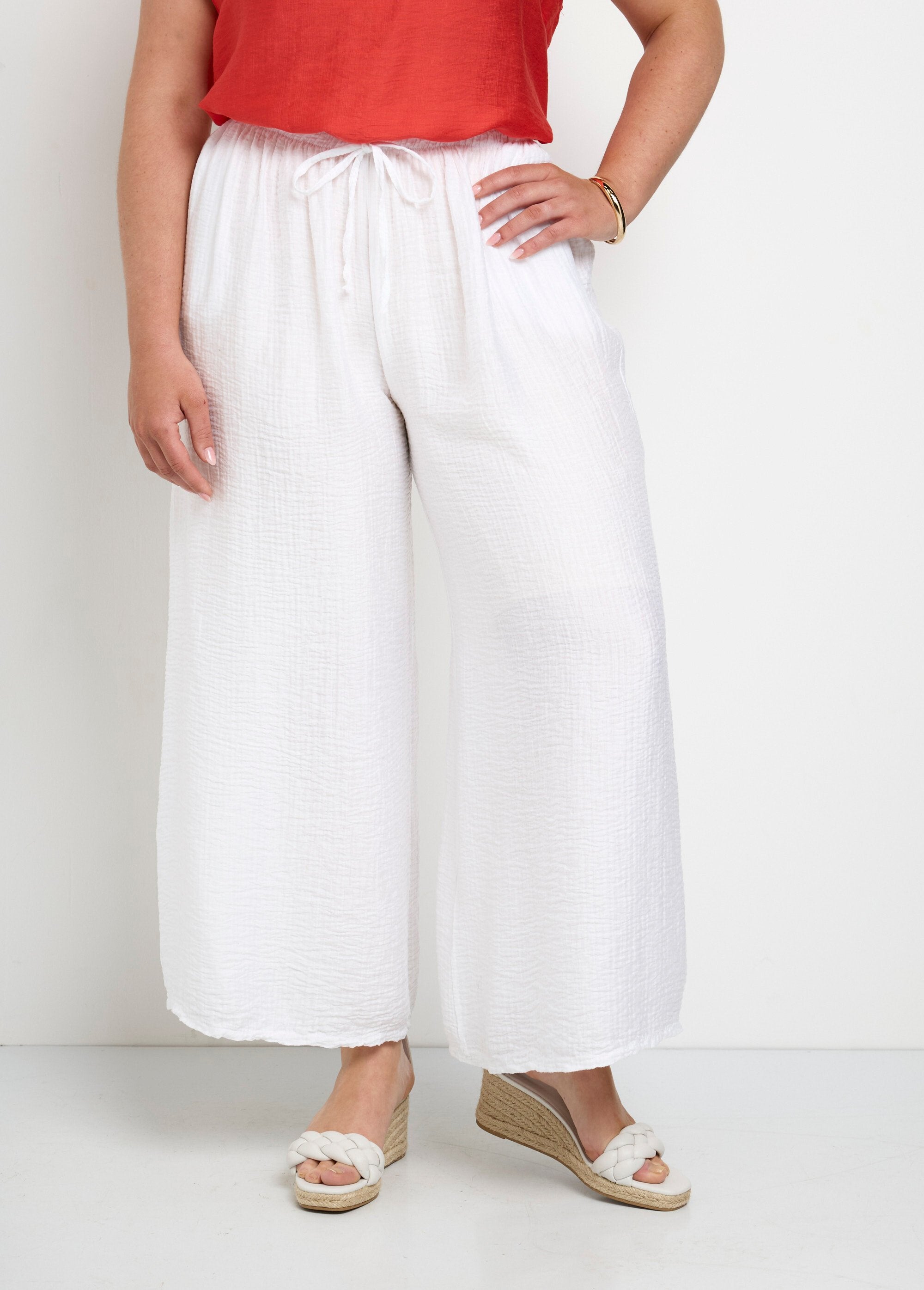 Pantalones_anchos_y_fluidos_de_lyocell_Blanco,_Blanca_FA1_curvy
