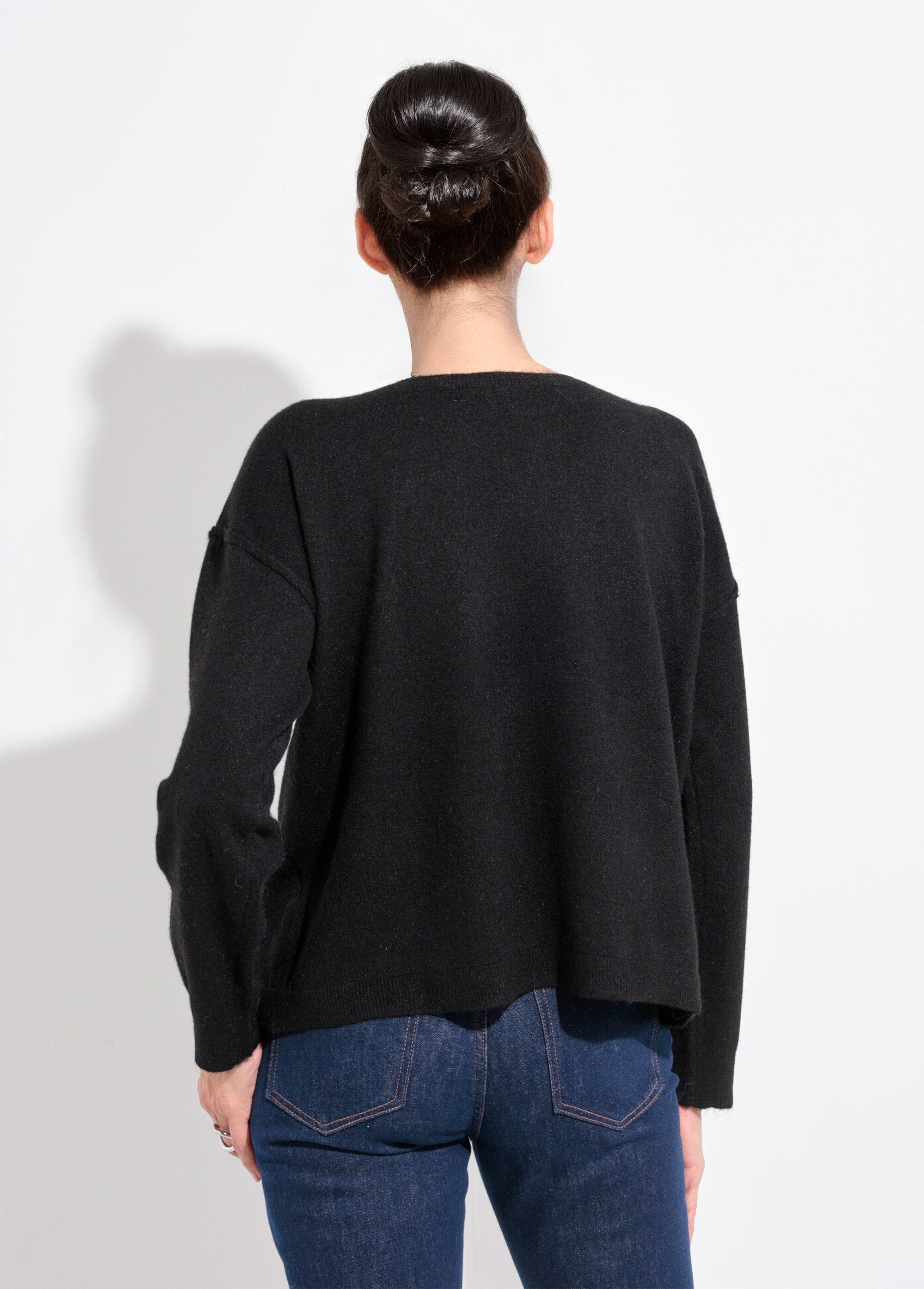 Suéter_cálido_de_cuello_redondo_con_lana._Negro_DO1_slim